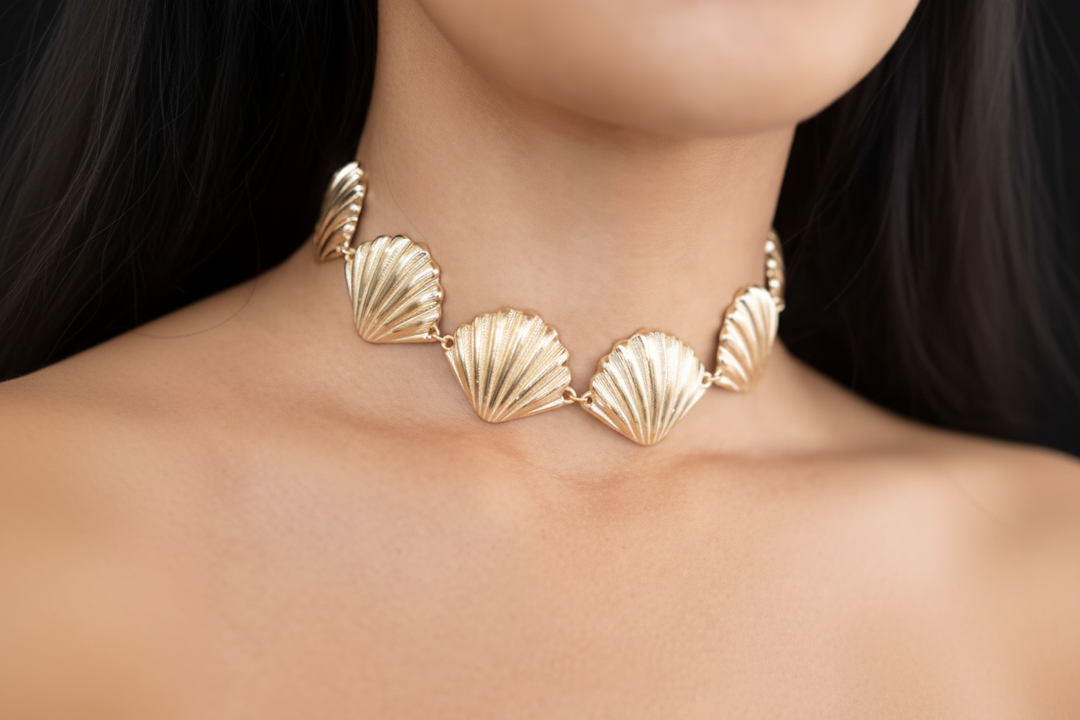A gold-tone scallop shell waist chain and can be choker
